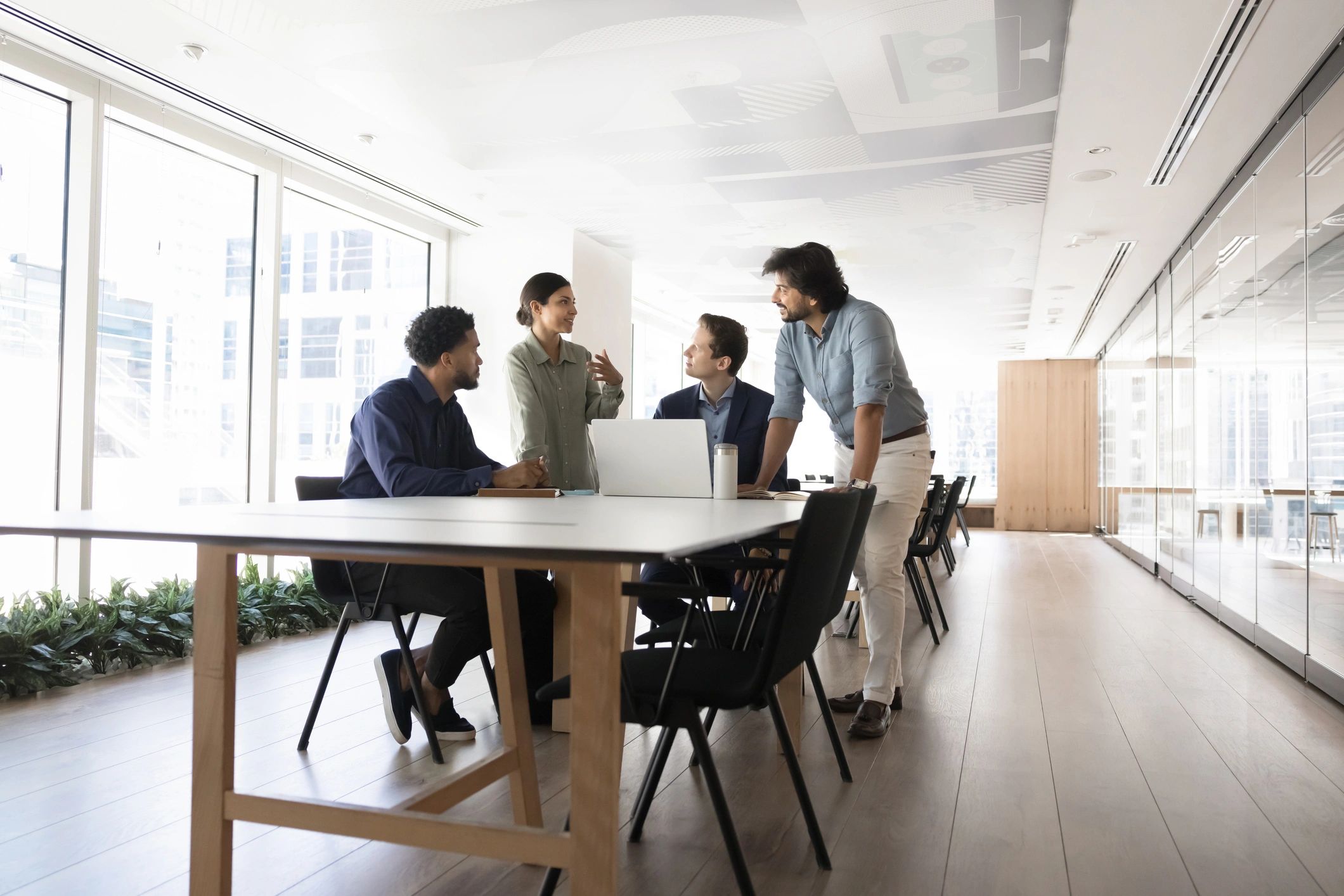 Team workshop discussion around a meeting table