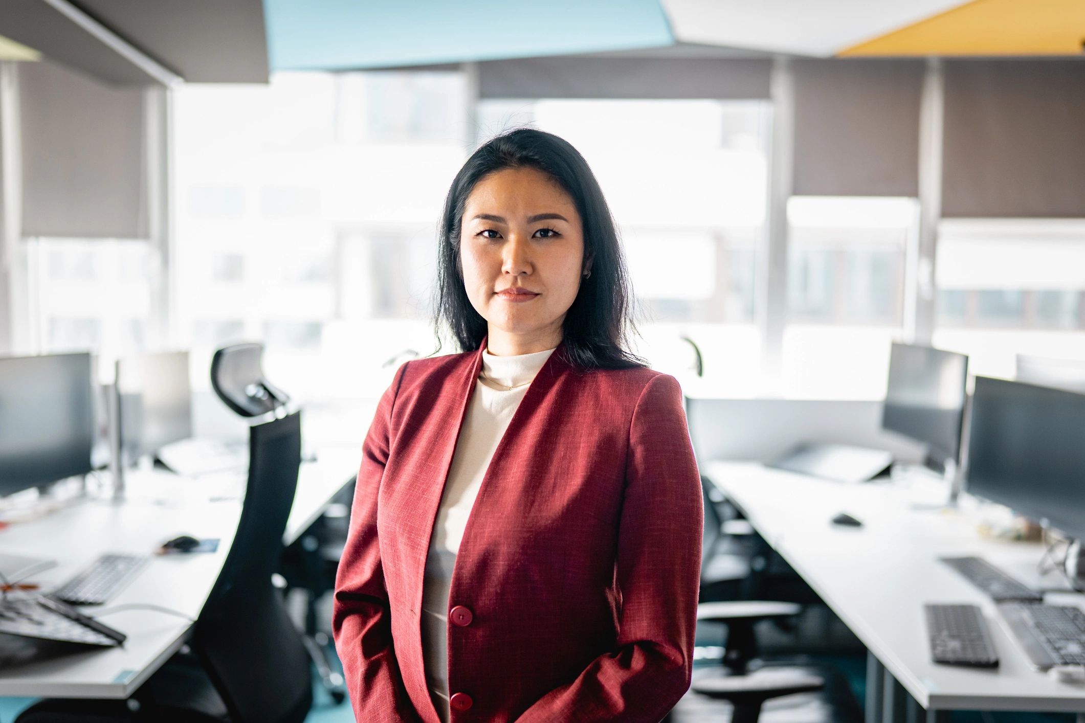Professional leadership coach portrait in a modern office